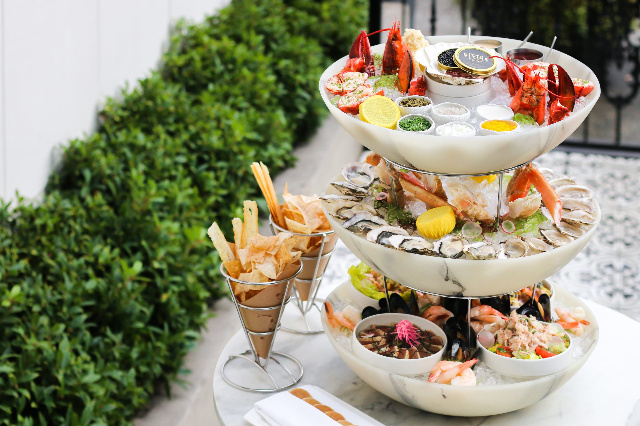 A three-tier seafood tower with caviar and lobster at Boulevard Kitchen & Oyster Bar