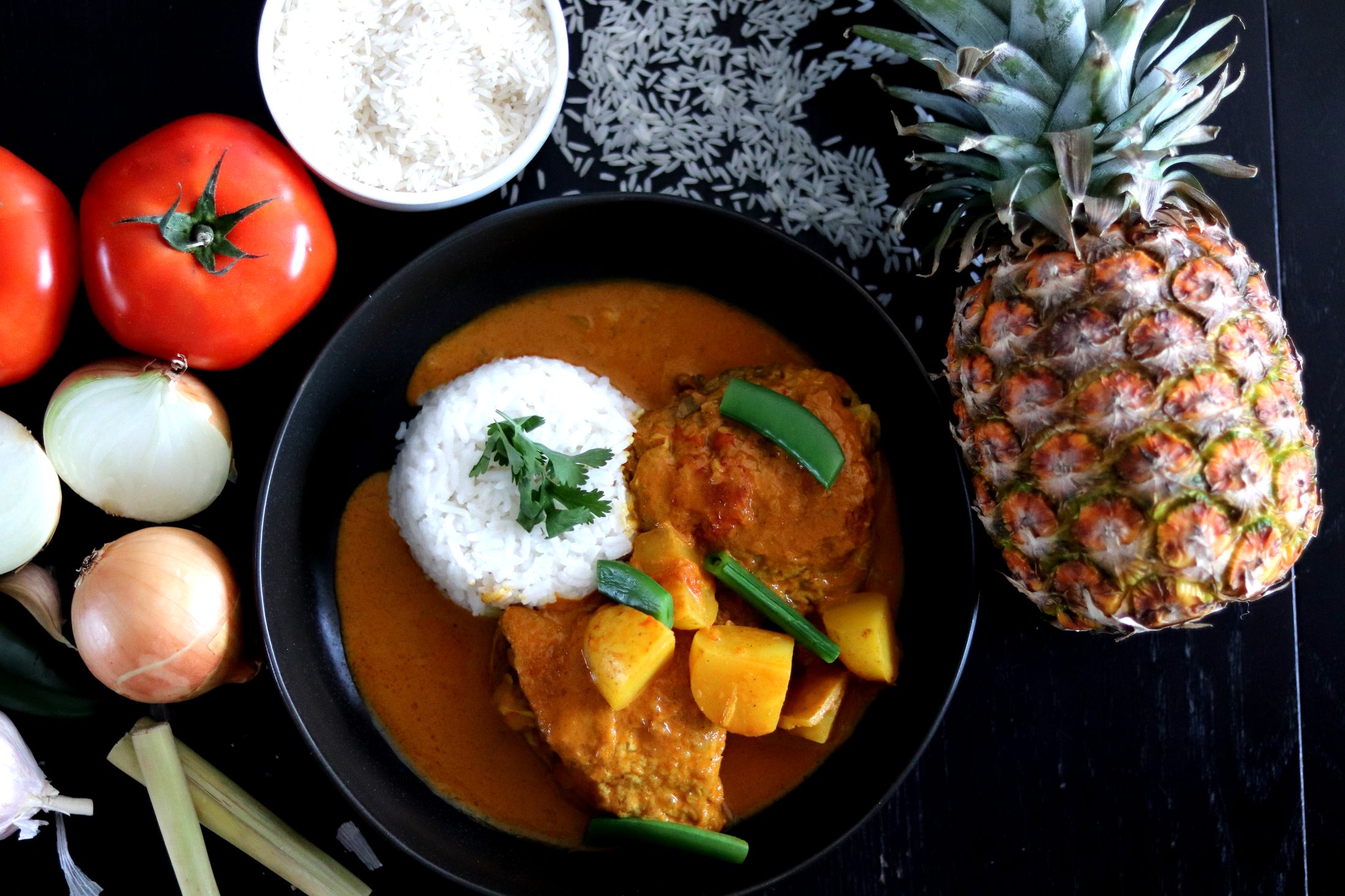 Mama Chen's chicken curry served with jasmine rice and pineapple