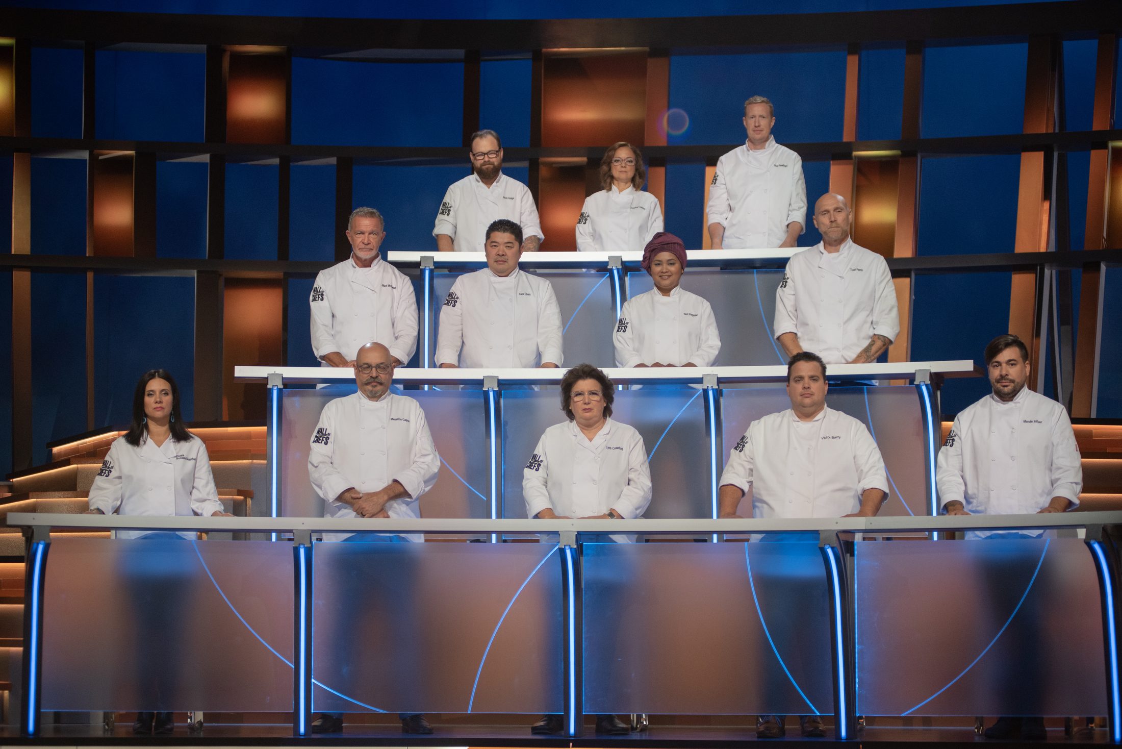 The Wall of Chefs panel, including Chef Alex Chen, on set